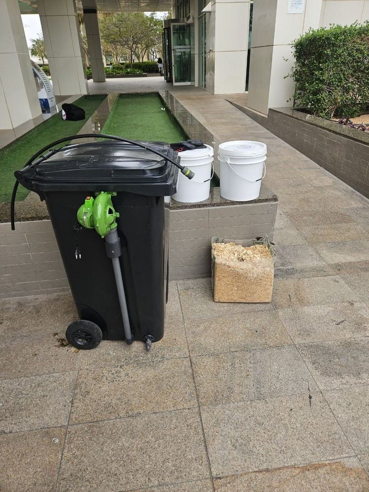 Commercial Oxygen Composter unit with intake buckets and bulking agent